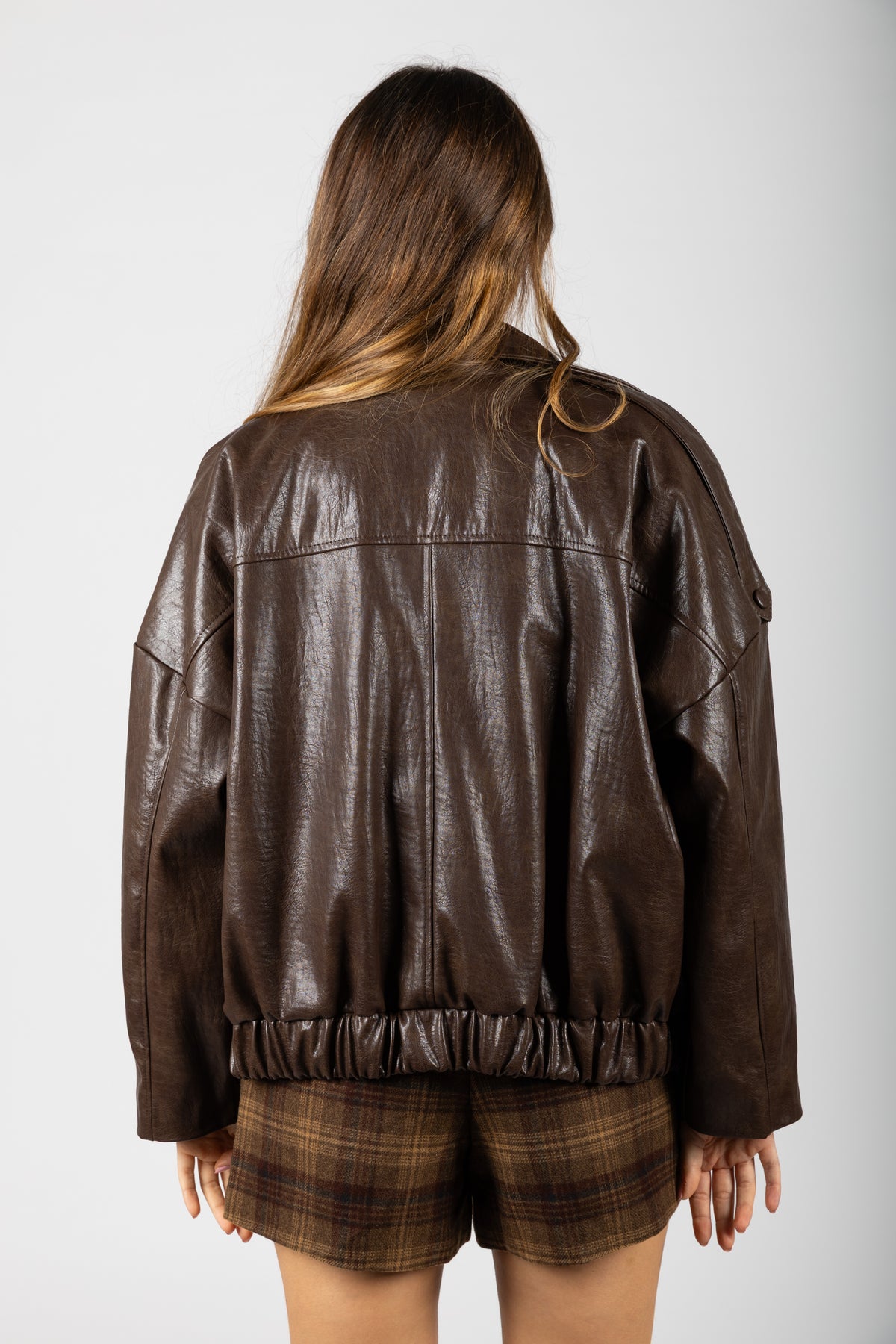 Bomber in ecopelle con collo imbuto